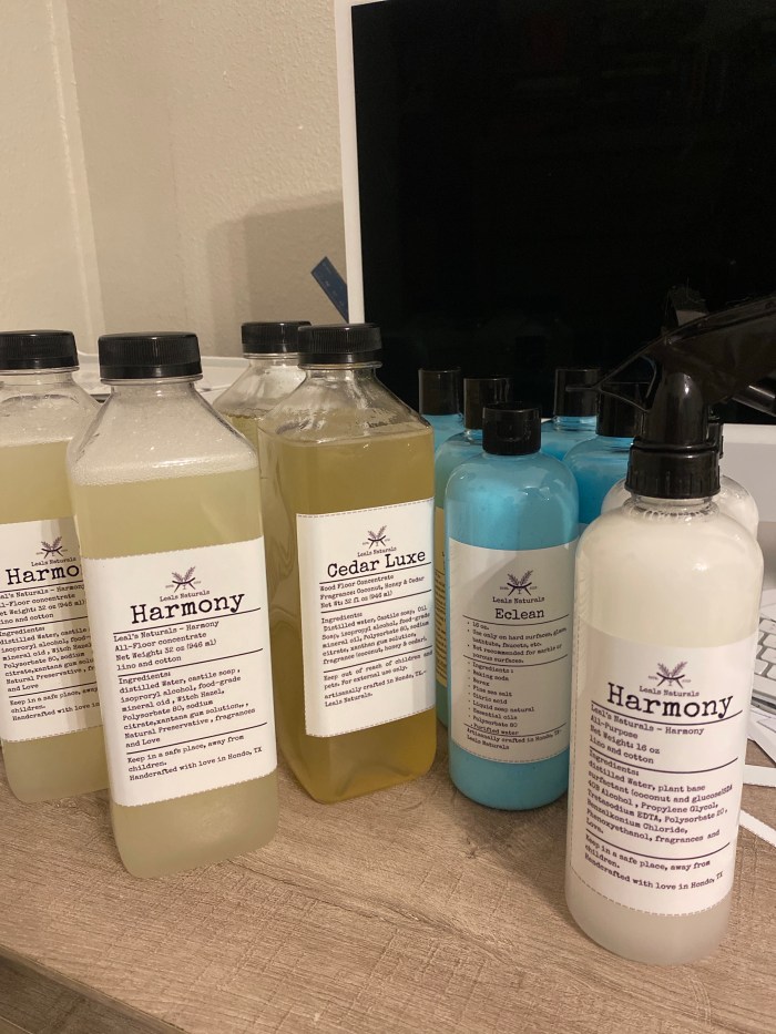 Leal&rsquo;s natural cleaning bottles lined up on a counter